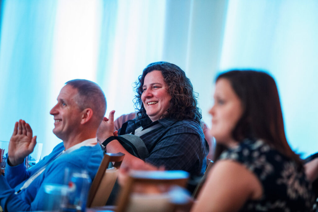 Attendees Laughing During Keynote - Dro Photography & Video Attendees Laughing During Keynote