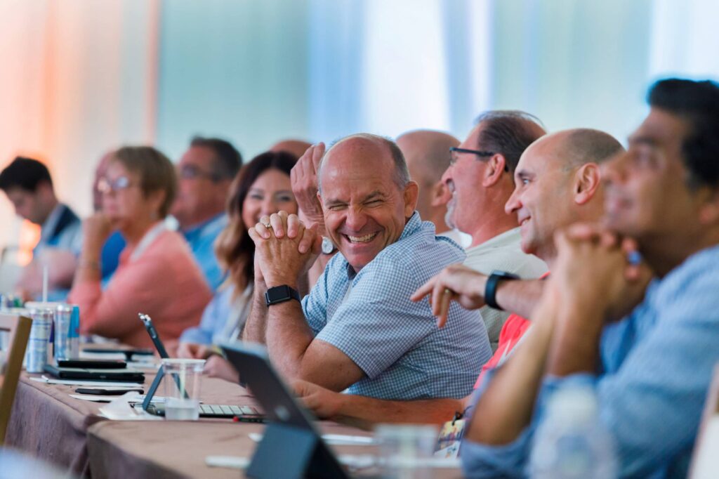 Buffalo Wild Wings Conference in Miami - Dro Photography & Video Miami corporate event photographer capturing attendees laughing during Buffalo Wild Wings conference in downtown Miami