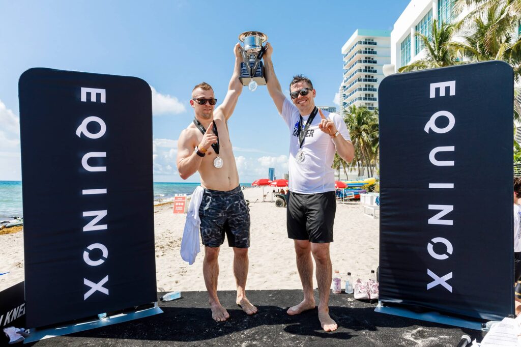 Equinox Award Celebration in Miami - Dro Photography & Video Equinox executives celebrating with trophy after winning competition at corporate event in Miami