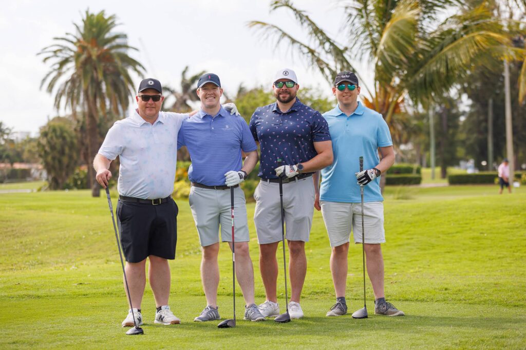 Golfers at Conference at JW Marriott Turnberry - Dro Photography & Video Miami corporate event photographer capturing golfers posing during conference at JW Marriott Turnberry Aventura