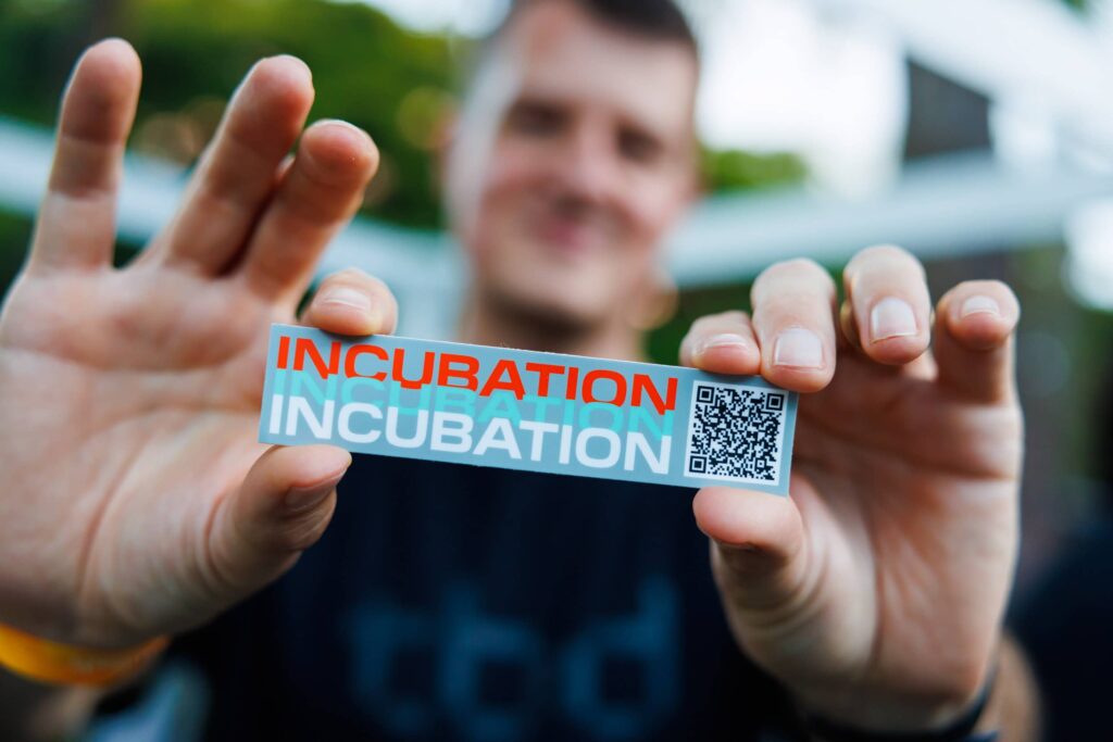 Square and Block Event at SLS Miami Beach - Dro Photography & Video Attendee holding branded merchandise during a corporate event at the SLS Hotel on Miami Beach