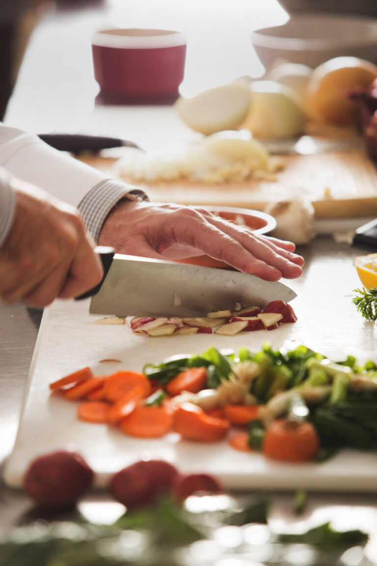 nyc-event-photographer-chef-cutting-vegetables-at-event - Dro Photography & Video