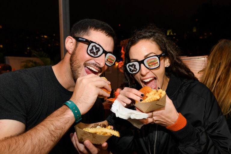 nyc-event-photography-burger-bash-attendees-eating - Dro Photography & Video
